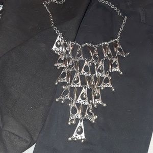 Silver colored triangle necklace